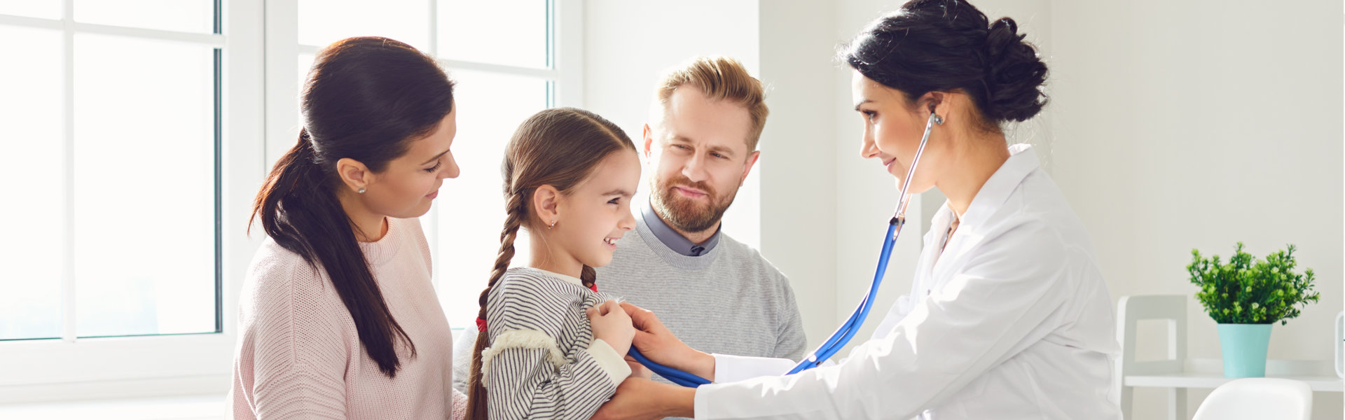 family visit to the doctor in office