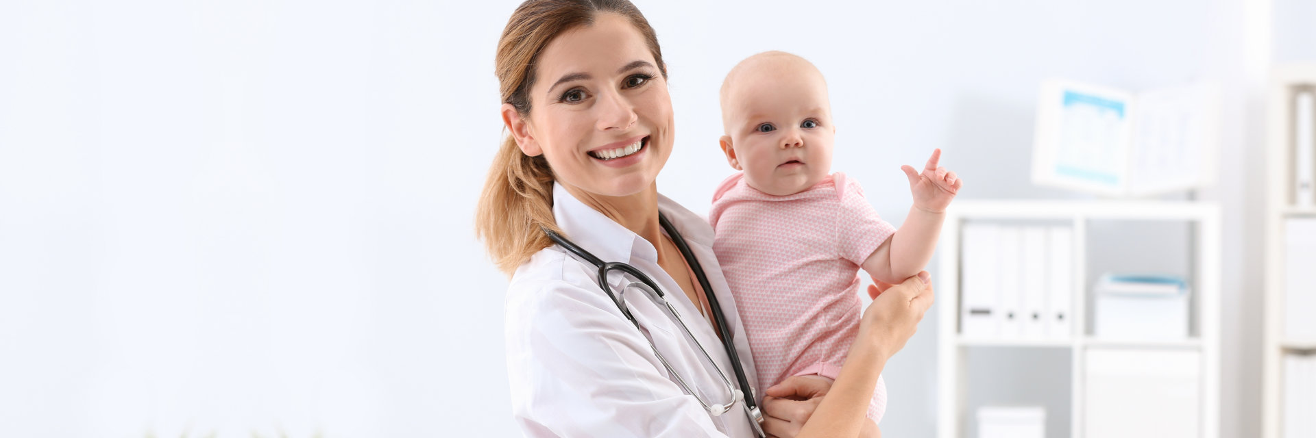 Children's doctor with cute baby